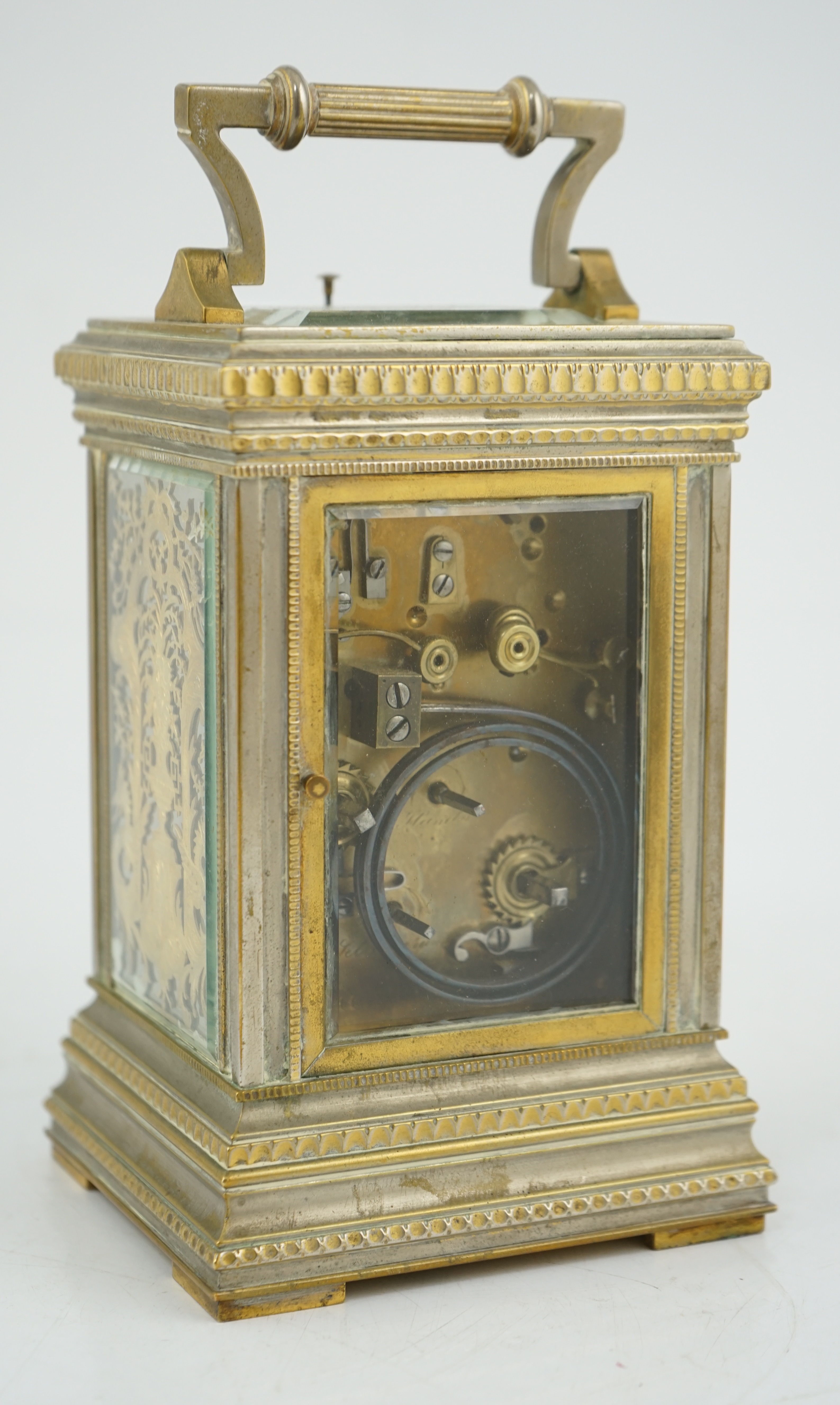 An early 20th century French silvered brass grand sonnerie alarum carriage clock